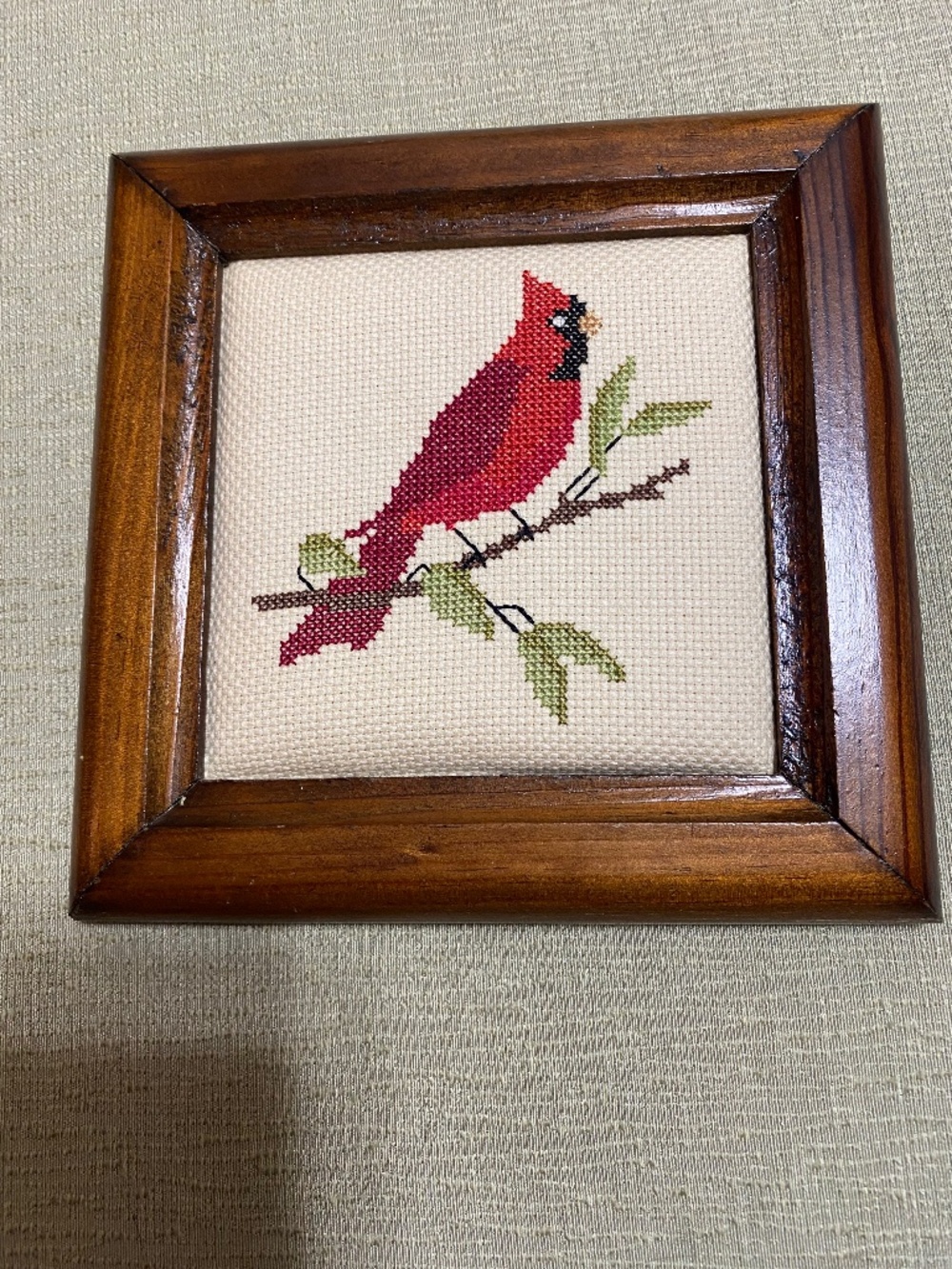 Cardinal framed 7X7 inch cross stitched.
